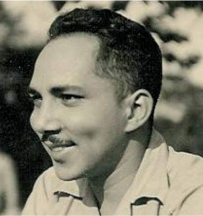 Foto en blanco y negro de un hombre con traje y corbata

Descripción generada automáticamente